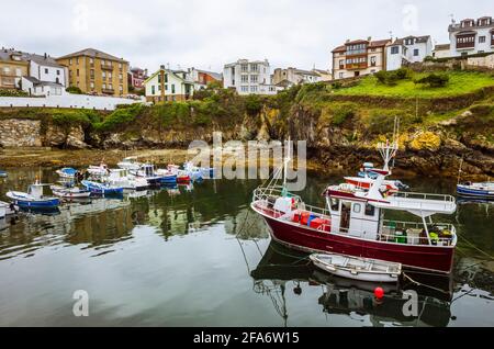 Fishing boats at the harbour of Tapia de Casariego village in Asturias, Spain. Stock Photo