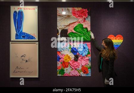 Bonhams, Knightsbridge, London, UK. 23 April 2021. The sale of Prints & Multiples will take place at Bonhams on 28 April. Image: (left) works by Tracey Emin; (right) works by Damien Hirst. Credit: Malcolm Park/Alamy Live News. Stock Photo