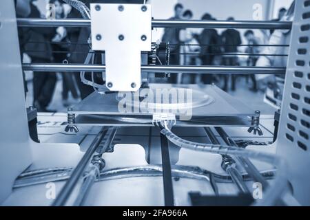 The process of working 3D printer and creating a three-dimensional object Stock Photo