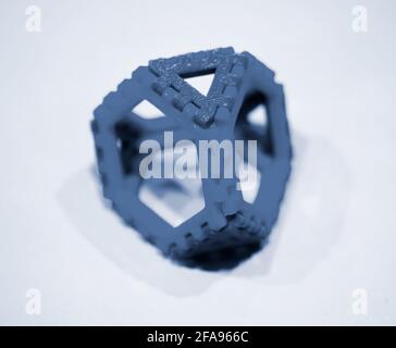 Abstract object printed by 3d printer on white background. Stock Photo