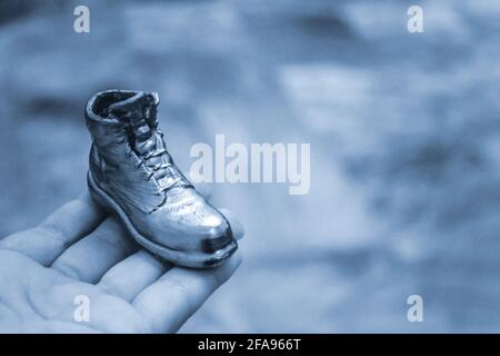 Object in the form of a boot printed on a 3d printer and covered with enamel Stock Photo