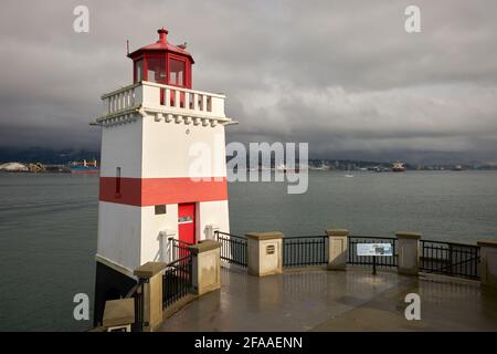 Brockton Point Dark Clouds and Sun. Storm clouds over the Brockton Point Lighthouse. Stanley Park, Vancouver. Stock Photo