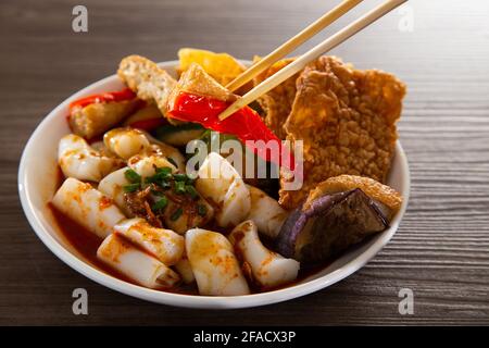 Chee Cheong Fun or Rice Noodle with sesame and sweet sauce served with yong tau foo Stock Photo