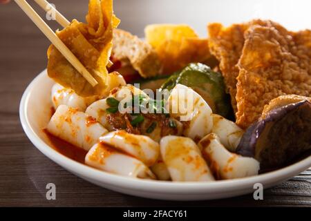 Chee Cheong Fun or Rice Noodle with sesame and sweet sauce served with yong tau foo Stock Photo