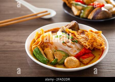 Curry Chee Cheong Fun or Rice Noodle served with yong tau foo Stock Photo