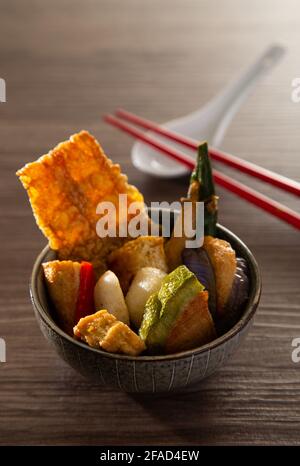 Chee Cheong Fun or Rice Noodle with sesame and sweet sauce served with yong tau foo Stock Photo