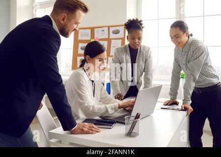 International company team having brainstorm in office concept Stock Photo