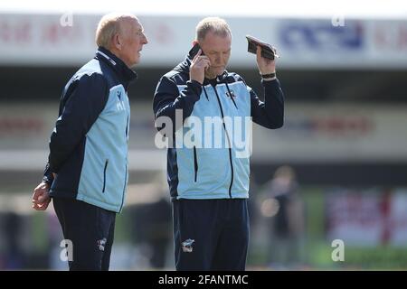 Russ Wilcox U23s manager of Scunthorpe United and Mark Lillis assistant manager after the Sky Bet League 2 behind closed doors match between Forest Gr Stock Photo