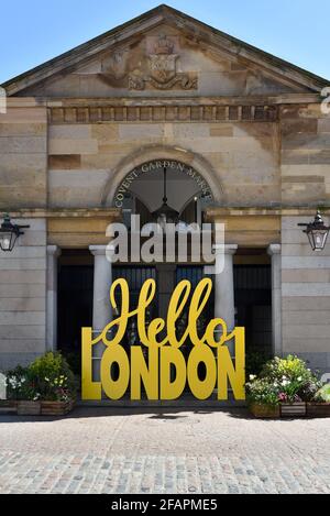 Covent Garden Piazza, London, UK. 23rd Apr 2021. A large 'Hello London' sign in Covent Garden. Credit: Matthew Chattle/Alamy Live News Stock Photo
