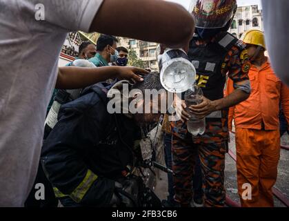 Dhaka, Bangladesh. 23rd Apr, 2021. Fire at Armanitola, Dhaka at around 4:45 AM, the fire broke out in a building known as a chemical factory. 2 people died and 23 were injured including 3 Firefighters. 15 Units of firefighters were required to get the fire under control. (Photo by Abul Hayat Rahadh/Pacific Press) Credit: Pacific Press Media Production Corp./Alamy Live News Stock Photo