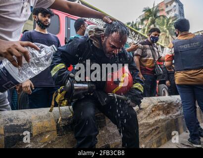 Dhaka, Bangladesh. 23rd Apr, 2021. Fire at Armanitola, Dhaka at around 4:45 AM, the fire broke out in a building known as a chemical factory. 2 people died and 23 were injured including 3 Firefighters. 15 Units of firefighters were required to get the fire under control. (Photo by Abul Hayat Rahadh/Pacific Press) Credit: Pacific Press Media Production Corp./Alamy Live News Stock Photo