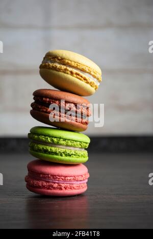 Multicolored macarons in the kitchen Stock Photo