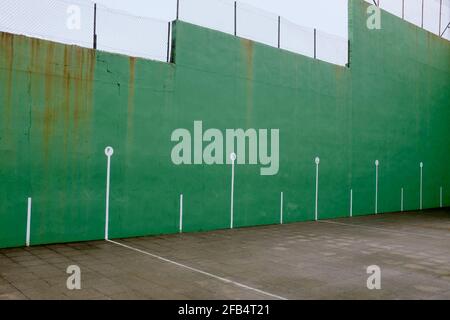 green sports ground with a wall Stock Photo