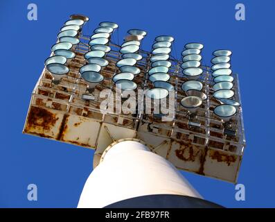 Floodlights against a blue sky looking up at Real Racing Football Club closed stadium Santander Cantabria Spain Stock Photo