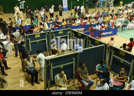 Guwahati, Assam, India. 23rd Apr, 2021. People getting vaccine against Covid-19 coronavirus at an indoor stadium in Guwahati, India on April 23, 2021. India today reported the biggest single-day spike with 332,730 new infections and 2,263 deaths. Credit: David Talukdar/ZUMA Wire/Alamy Live News Stock Photo