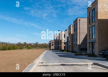 A row of newly built houses in Trumpington Meadows.  The landscaping in front of the houses is still in progress. Stock Photo