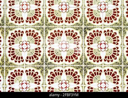 Full frame of green and brown colored mosaic wall with square tiles Stock Photo
