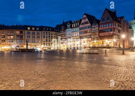Germany, Hesse, Frankfurt, Illuminated Romerberg square at night with half-timbered townhouses in background Stock Photo