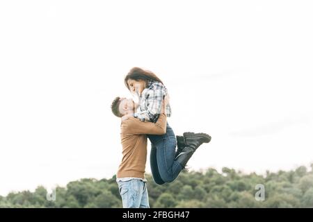 Boyfriend and girlfriend in love. Love and romance concept. Family weekend.  Romantic date in park. Couple in love sit on bench. Youth hang out. Summer  vacation. Enjoying nice weekend together Stock Photo |