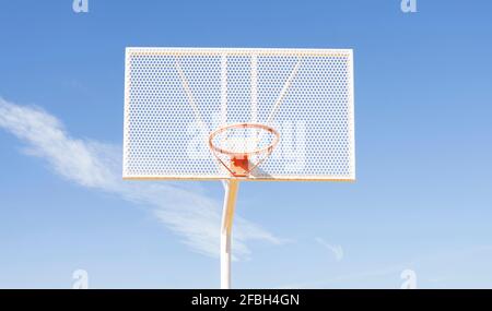 Basketball hoop over on sports court Stock Photo