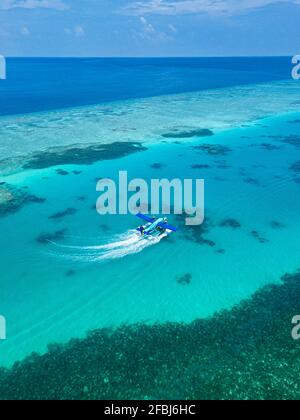 Aerial view of hydroplane taking off from Male Atoll Stock Photo