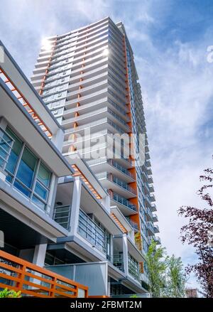 The corner of brand new apartment building on blue sky background Stock ...