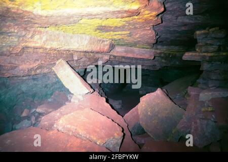 artificial cave under earth journey. wild cave, forgotten passages deep underground Stock Photo