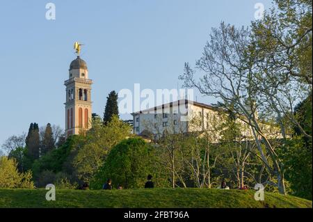 Udine, Italy (23rd April 2021) - View of the hill with the castle and the church of Saint Mary from Piazza I maggio square Stock Photo