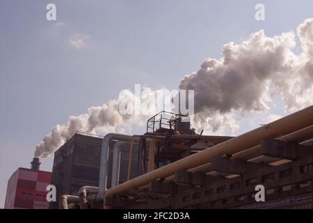 Industry metallurgical plant smoke from pipes mining.  Stock Photo