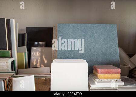 Selective focus view, stack group and heap of stone, granite marble tile samples. Example of building materials. Stock Photo