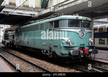 VERSAILLES, FRANCE - JULY 22, 2011: Heritage electric locomotive BB 25200 series standing on a platform of Versailles Chantier train station. It's a p Stock Photo