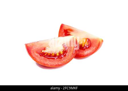 Fresh tomato slices isolated on white background. Stock Photo