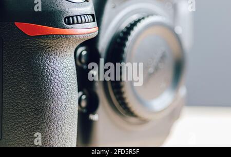 Professional build quality modern DSLR and front buttons close up, built with rugged magnesium alloy and carbon fiber materials, a sturdy camera with Stock Photo