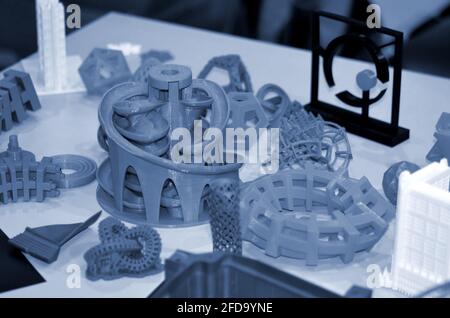 Forms printed by 3d printer. Objects printed on a 3d printer on a table. Stock Photo