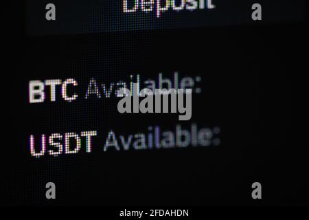 Shallow depth of field footage with details of Bitcoin cryptocurrency on a crypto exchange app, on a digital screen. Stock Photo