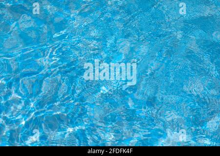 Surface of Blue ripped water in the swimming pool.  Stock Photo