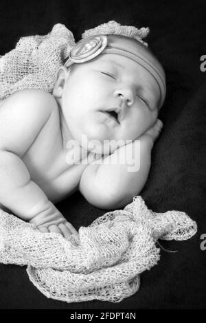 Beautiful baby girl sleeping, one week old baby girl Stock Photo