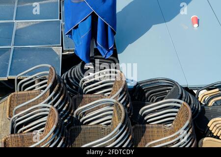 Gastronomy lockdown, closed restaurant,cafe or bar due to corona epidemic, chairs and tables stacked,symbol picture Stock Photo