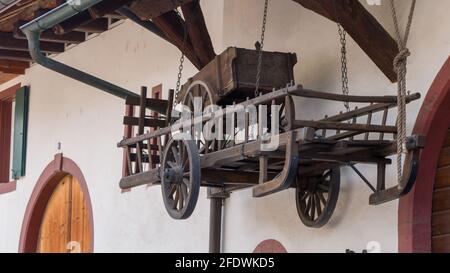 Old wooden carts on the wall Stock Photo