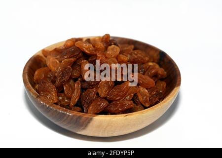 Dried raisins on white background, Egyptian raisins Stock Photo