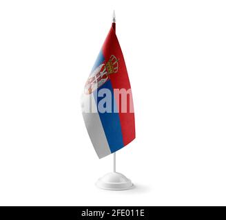 Small national flag of the Serbia on a white background Stock Photo