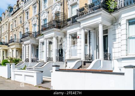 LONDON, UK - APRIL 21, 2021: Residential street in Mailda Vale in London. This affluent neighbourhood has many large late Victorian and Edwardian bloc Stock Photo