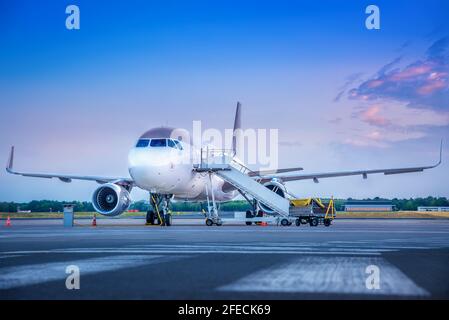 modern airplane gets prepared for take off Stock Photo
