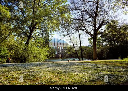 The beautiful public park 'Ständehauspark' in Düsseldorf with the historic Ständehaus building in the background, built from 1876 - 1880. Stock Photo