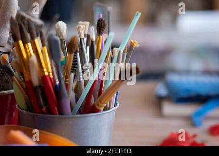 Various paint brushes close up. Tools for art lesson at school. Stock Photo
