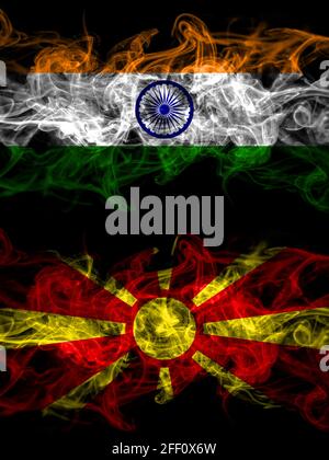 India, Indian vs Macedonia, Macedonian smoky mystic flags placed side by side. Thick colored silky abstract smoke flags. Stock Photo