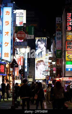 Tokyo, Japan. 24th Apr, 2021. Colorful billboards illuminate the Kabukicho entertainment and Red Light district in Shinjuku Ward. The Tokyo government will request neon signs and other lights to be turned off after 8 p.m. to discourage people from going out at night. Japan decided to start a new state of emergency from April 25th through May 11, three months before the Olympic opening ceremony. Credit: Rodrigo Reyes Marin/ZUMA Wire/Alamy Live News
