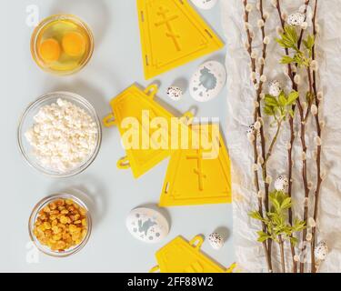 Holy week. Preparation for the Orthodox Easter. Holliday horizontal composition with ingredients for making easter cakes and decorating eggs with will Stock Photo