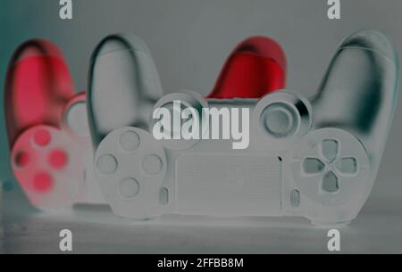 Next generation video game controls stylized on light background. Electronic game accessories. State-of-the-art controllers. Gamer commands. Electroni Stock Photo
