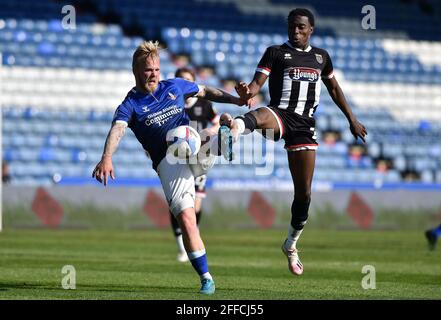 OLDHAM, UK. APRIL 24TH Oldham Athletic's Marcel Hilssner tussles with Jay Matete of Grimsby Town during the Sky Bet League 2 match between Oldham Athletic and Grimsby Town at Boundary Park, Oldham on Saturday 24th April 2021. (Credit: Eddie Garvey | MI News) Credit: MI News & Sport /Alamy Live News Stock Photo